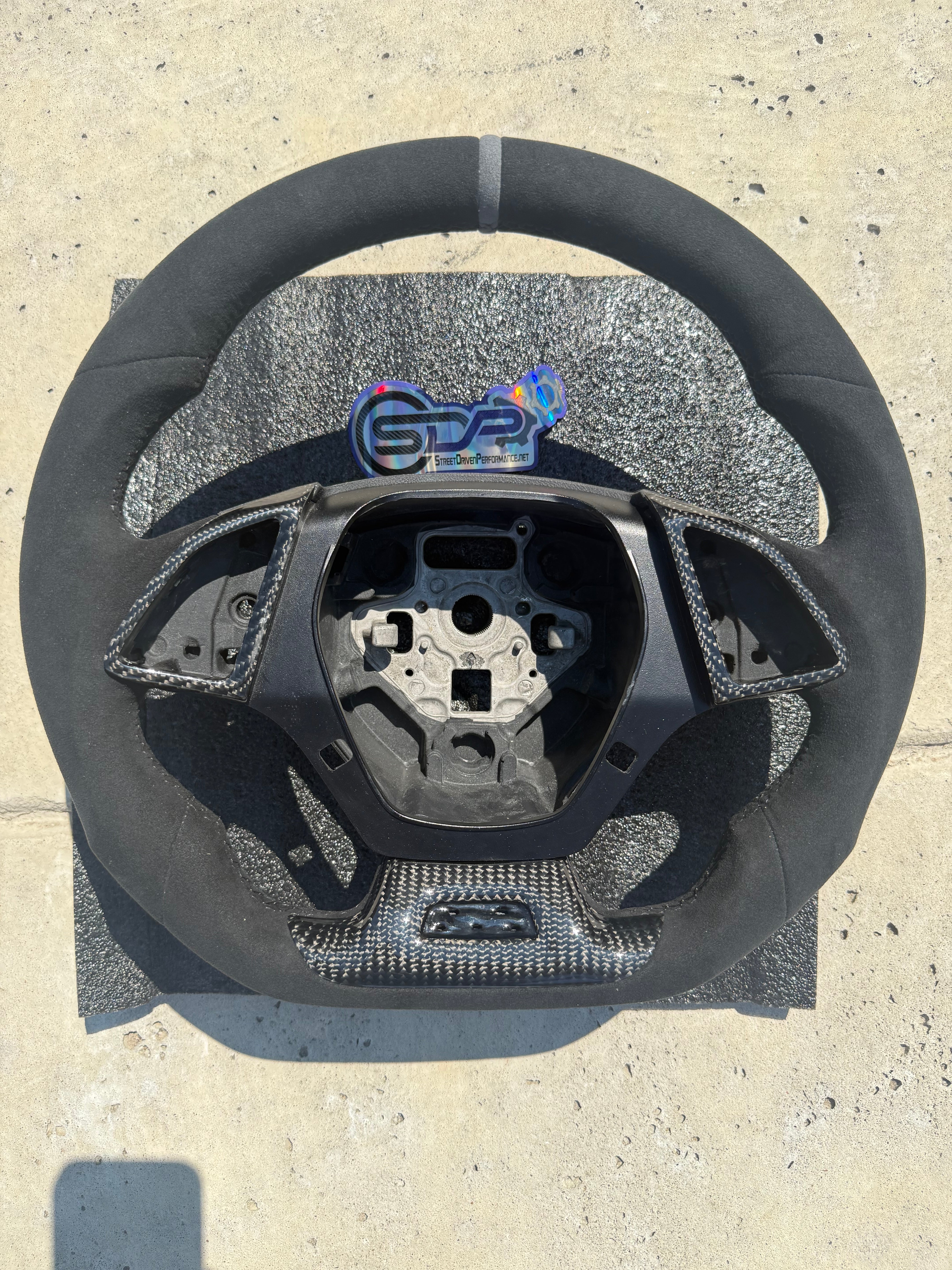 2016 - 2024+ 6th Gen Camaro Carbon Fiber / Alcantara Suede Steering Wheel with badge cut out at bottom